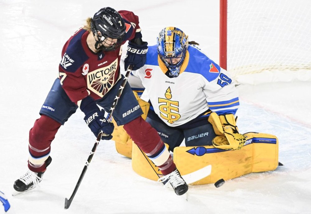 Montreal Victoire's Laura Stacey (7) moves in on Toronto Sceptres goaltender Kristen Campbell during second period PWHL hockey action in Laval, Que. Sunday, March 23, 2025. THE CANADIAN PRESS/Graham Hughes