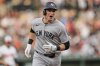 New York Yankees' Ben Rice reacts toward the dugout after hitting a home run during the second inning of a baseball game against the Baltimore Orioles, Tuesday, April 29, 2025, in Baltimore. (AP Photo/Stephanie Scarbrough)