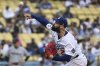 Los Angeles Dodgers pitcher Tony Gonsolin (26) throws during in the first inning of a baseball game against the Miami Marlins, Wednesday, April 30, 2025, in Los Angeles. (AP Photo/Wally Skalij)