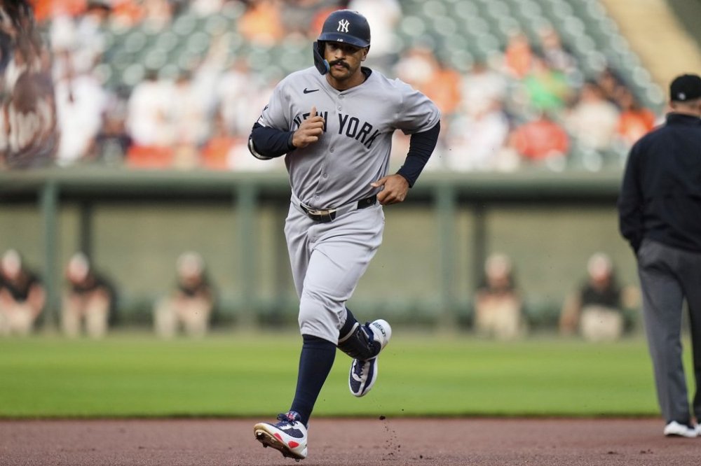 New York Yankees' Trent Grisham rounds the bases after hitting a home run during the first inning of a baseball game against the Baltimore Orioles, Tuesday, April 29, 2025, in Baltimore. (AP Photo/Stephanie Scarbrough)