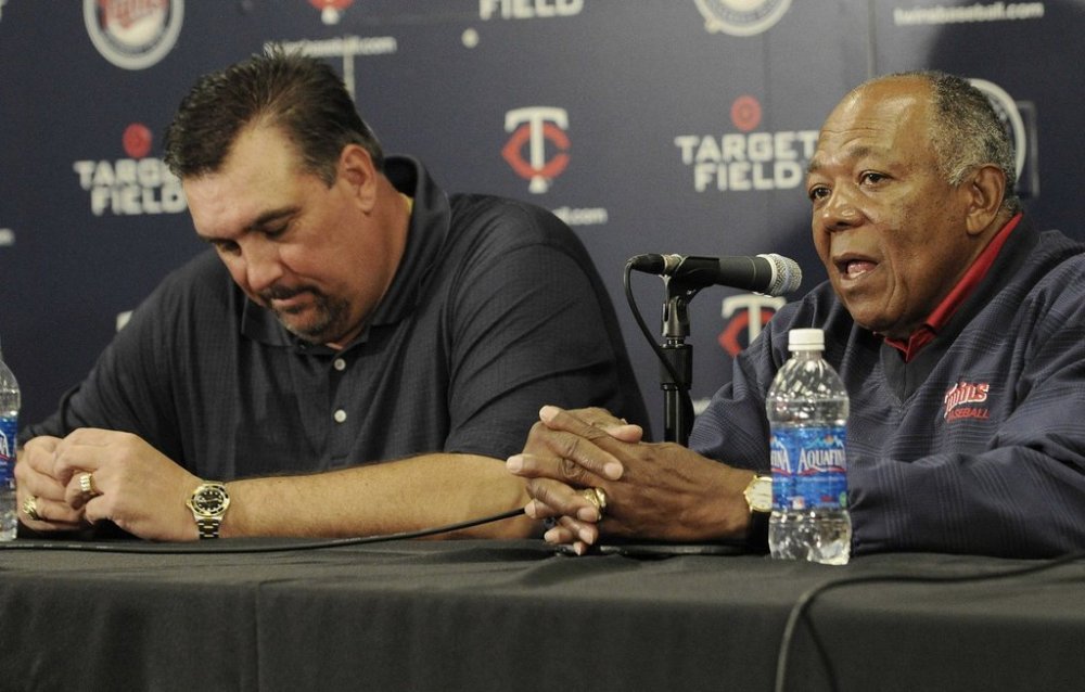 FILE - Former Minnesota Twins' Kent Hrbek, left, listens as former Twins' Tony Oliva recalles memories of his teamamte, Twins Hall of Fame baseball player Harmon Killebrew during a news conference at Target Field on May 17, 2011 in Minneapolis. (AP Photo/Jim Mone, File)