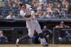 New York Yankees' Aaron Judge hits a single during the sixth inning of a baseball game against the Tampa Bay Rays, Saturday, May 3, 2025, in New York. (AP Photo/Frank Franklin II)