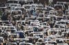 Aston Villa fans cheer ahead of the Champions League quarterfinal second leg soccer match between Aston Villa and Paris Saint-Germain at Villa Park stadium, Birmingham, England, Tuesday, April 15, 2025. (AP Photo/Kirsty Wigglesworth)
