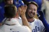 Kansas City Royals' Drew Waters celebrates in the dugout after hitting a solo home run during the sixth inning of a baseball game against the Colorado Rockies, Tuesday, April 22, 2025, in Kansas City, Mo. (AP Photo/Charlie Riedel)