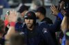 Toronto Blue Jays' George Springer  celebrates in the dugout after hitting a home run during fifth inning MLB baseball action against the Cleveland Guardians in Toronto on Friday May 2, 2025. THE CANADIAN PRESS/Chris Young