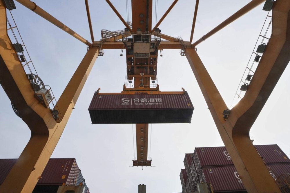 FILE - Cranes work on stacks of containers at the Bangkok Port in Bangkok, Thailand, Thursday, April 10, 2025. (AP Photo/Sakchai Lalit, File)