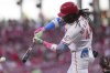 Cincinnati Reds' Elly De La Cruz hits a double in the first inning of a baseball game against the St. Louis Cardinals, Monday, April 28, 2025, in Cincinnati. (AP Photo/Kareem Elgazzar)