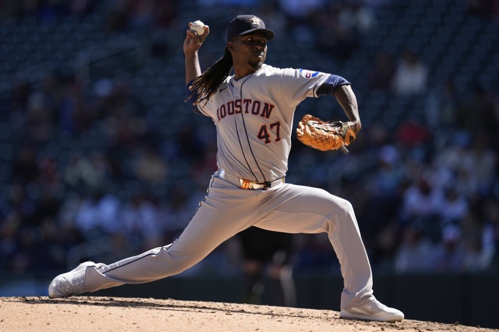 FILE - Houston Astros relief pitcher Rafael Montero (47) delivers during the fifth inning of a baseball game against the Minnesota Twins, April 6, 2025, in Minneapolis. (AP Photo/Abbie Parr, File)
