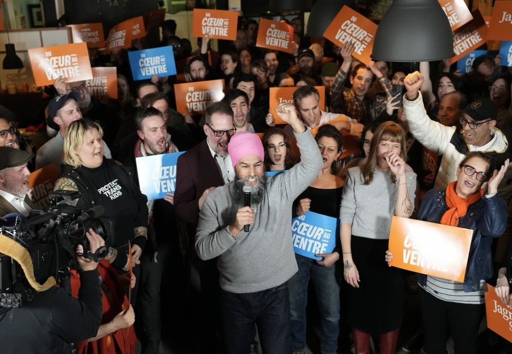 NDP Leader Jagmeet Singh reacts at a campaign event with supporters during a federal election campaign stop in Montreal on Sunday, March 23, 2025. THE CANADIAN PRESS/Nathan Denette