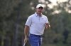 Rory McIlroy, of Northern Ireland, waves after making a putt on the 14th hole during the third round at the Masters golf tournament, Saturday, April 12, 2025, in Augusta, Ga. (AP Photo/Julia Demaree Nikhinson)