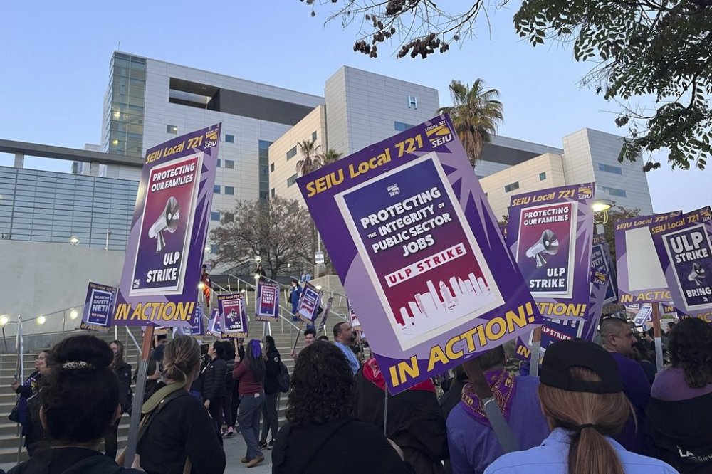 Los Angeles County workers picket outside of the Los Angeles General Medical Center after walking off the job Monday, April 28, 2025, in Los Angeles. (AP Photo/Jaimie Ding)