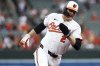 Baltimore Orioles' Gunnar Henderson rounds third base to score a run during the third inning of a baseball game against the Kansas City Royals, Sunday, May 4, 2025, in Baltimore. (AP Photo/Daniel Kucin Jr.)