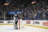 St. Louis Blues fans react as Winnipeg Jets goaltender Connor Hellebuyck (37) looks on during the second period in Game 6 of an NHL first-round playoff series on Friday, May 2, 2025, in St. Louis. (AP Photo/Jeff Le)