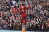 Liverpool's Virgil van Dijk celebrates after scoring his side's second goal during the English Premier League soccer match between Liverpool and West Ham United at Anfield in Liverpool, Sunday, April 13, 2025. (AP Photo/Ian Hodgson)