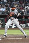 Baltimore Orioles' Jordan Westburg gets hit by the pitch against the Arizona Diamondbacks in the first inning during a baseball game, Tuesday, April 8, 2025, in Phoenix. (AP Photo/Rick Scuteri)