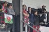 Wrexham co-owner Rob McElhenney, center, watches from the stands during the English Football League One Soccer match between Wrexham and Bristol Rovers, at the SToK Racecourse, Wrexham, Wales, Friday April 18, 2025. (Cody Froggatt/PA via AP)