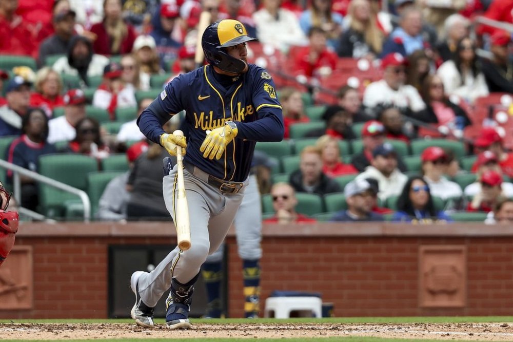 Milwaukee Brewers' Christian Yelich watches his two-RBI single during the fourth inning of a baseball game against the St. Louis Cardinals, Sunday, April 27, 2025, in St. Louis. (AP Photo/Scott Kane)