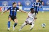 CF Montreal's Samuel Piette, left, moves in on Orlando City's Ivan Angulo during second half MLS soccer action in Montreal, Saturday, April 19, 2025. THE CANADIAN PRESS/Graham Hughes
