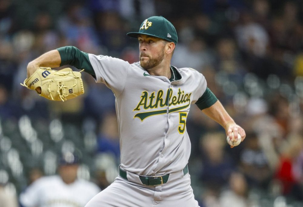 Athletics starting pitcher Jeffrey Springs throws to the Milwaukee Brewers during the first inning of a baseball game, Sunday, April 20, 2025, in Milwaukee. (AP Photo/Jeffrey Phelps)