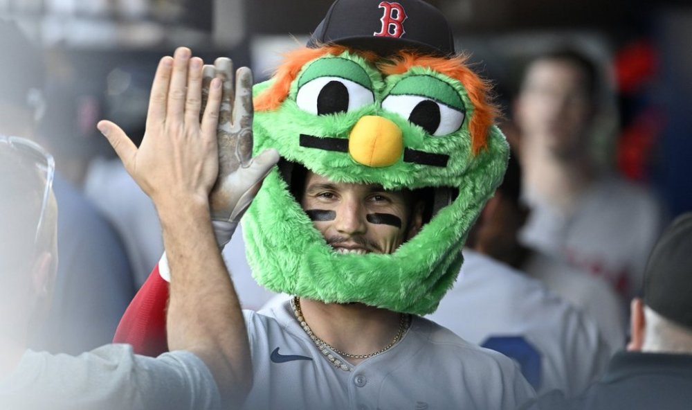 Boston Red Sox's Jarren Duran celebrates his two-run home run during the second inning of a baseball game against the Tampa Bay Rays, Tuesday, April 15, 2025, in Tampa, Fla. (AP Photo/Jason Behnken)