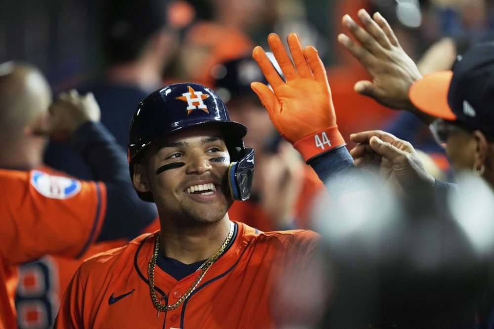 Houston Astros' Cam Smith celebrates the dugout after hitting a home run during the second inning of a baseball game against the San Diego Padres in Houston, Friday, April 18, 2025. Yainer Diaz and Jake Meyers also scored.(AP Photo/Ashley Landis)