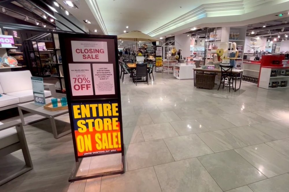 Sale signage is shown at a Hudson's Bay store in Toronto, in a still image made from video footage shot on Friday, April 25, 2025. The clock is ticking down on two deadlines that may determine the fate of Hudson's Bay. THE CANADIAN PRESS/Tara Deschamps