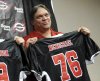 FILE - Former Chicago Bears defensive tackle Steve McMichael holds a Chicago Slaughter jersey during a news conference Feb. 19, 2010, in Chicago. (John J. Kim/Chicago Sun-Times via AP, File)