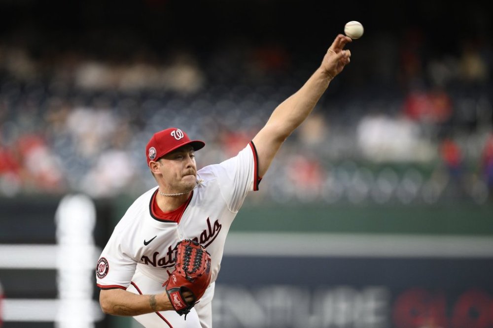 Washington Nationals starting pitcher Mitchell Parker throws during the first inning of a baseball game against the Baltimore Orioles, Tuesday, April 22, 2025, in Washington. (AP Photo/Nick Wass)