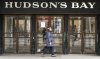 A pedestrian passes the Hudson's Bay store in downtown Calgary, Alta., Thursday, March 20, 2025. THE CANADIAN PRESS/Jeff McIntosh