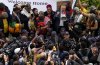 Expelled South Africa Ambassador Ebrahim Rasool speaks to supporters upon his arrival at Cape Town International Airport, in Cape Town, South Africa, Sunday, March 23, 2025. (AP Photo/Nardus Engelbrecht)