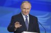 Russian President Vladimir Putin gestures while speaking during a ceremony for the Sluzhenie All-Russian Municipal Service Awards at the Russia National Center in Moscow, Russia, Monday, April 21, 2025. (Ramil Sitdikov, Sputnik, Kremlin Pool Photo via AP)