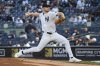 New York Yankees' Clarke Schmidt pitches during the second inning of the second baseball game of a doubleheader against the Toronto Blue Jays, Sunday, April 27, 2025, in New York. (AP Photo/Pamela Smith)