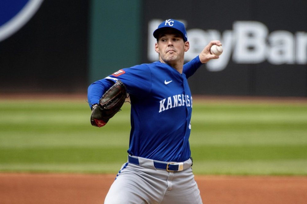 Kansas City Royals starting pitcher Cole Ragans delivers against the Cleveland Guardians during the first inning of a baseball game in Cleveland, Sunday, April 13, 2025. (AP Photo/Phil Long)