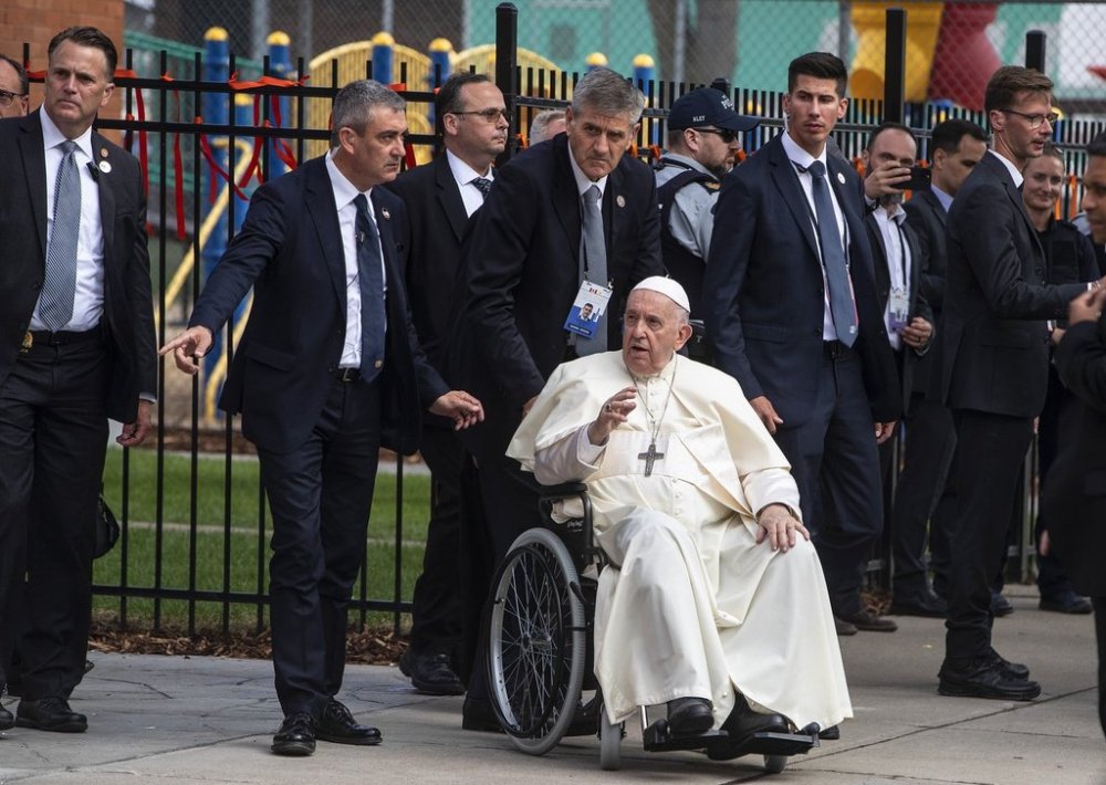 Pope Francis waves as he leaves the Sacred Heart Church of the First People, in Edmonton, during his Papal visit across Canada on Monday July 25, 2022. THE CANADIAN PRESS/Jason Franson
