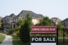 The number of homes that changed hands across the country in March was down 9.3 per cent compared with a year ago, as the Canadian Real Estate Association downgraded its forecast for home sales activity in 2025. A real estate sign is shown in Vaughan, Ont. on Thursday Sept. 12, 2024. THE CANADIAN PRESS/Paige Taylor White