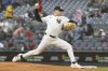 New York Yankees' Will Warren pitches during the first inning of a baseball game against the San Francisco Giants, Saturday, April 12, 2025, in New York. (AP Photo/Pamela Smith)