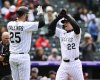 Colorado Rockies' Mickey Moniak, right, is congratulated as he crosses home plate by Jacon Stallings after hitting a two-run home run off Washington Nationals starting pitcher MacKenzie Gore in the second inning Saturday, April 19, 2025, in Denver. (Andy Cross/The Denver Post via AP)