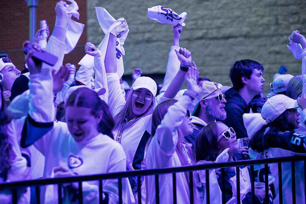 BROOK JONES / FREE PRESS
Winnipeg Jets fan Senna Price (middle) cheers as she attends the Jets Whiteout street party for the Game 5 of the National Hockey League Stanley Cup playoff between the hometown Winnipeg Jets and the visiting St. Louis Blues in Winnipeg, Wednesday.