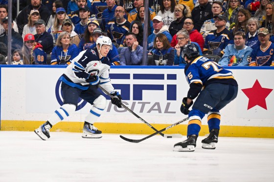 Winnipeg Jets' Vladislav Namestnikov (7) skates with the puck as St. Louis Blues' Tyler Tucker, right, defends during the first period of Game 4 on Sunday in St. Louis. (Connor Hamilton / The Associated Press files)
