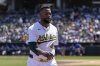 Athletics pitcher Luis Severino (40) walks to the dugout during the second inning of a baseball game against the New York Mets Sunday, April 13, 2025, in West Sacramento, Calif. (AP Photo/Sara Nevis)