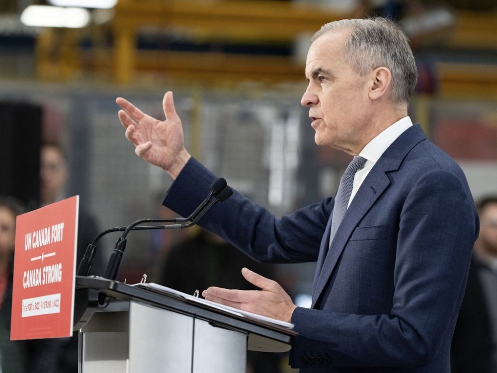 Liberal Leader Mark Carney makes an announcement during a campaign stop at Nova Bus in Saint-Eustache, Que., on Tuesday, April 15, 2025. THE CANADIAN PRESS/Christinne Muschi