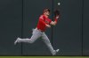 Los Angeles Angels right fielder Mike Trout catches a fly ball hit by Minnesota Twins' Ryan Jeffers in the fourth inning of a baseball game Sunday, April 27, 2025, in Minneapolis. (AP Photo/Bruce Kluckhohn)
