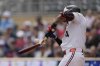 Minnesota Twins' Carlos Correa (4) breaks his bat while grounding into a fielder's choice during the first inning of a baseball game against the Detroit Tigers, Saturday, April 12, 2025, in Minneapolis. (AP Photo/Abbie Parr)
