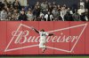 New York Yankees outfielder Jasson Domínguez makes a leaping catch during the fourth inning of a baseball game against the Kansas City Royals Monday, April 14, 2025, in New York. (AP Photo/Seth Wenig)