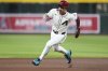 Arizona Diamondbacks' Corbin Carroll advances to third base on a single by Diamondbacks' Geraldo Perdomo against the Baltimore Orioles during the first inning of a baseball game Wednesday, April 9, 2025, in Phoenix. (AP Photo/Ross D. Franklin)