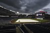 A weather delay is in effect as a tarp protects the field before a baseball game between the Washington Nationals and the Cleveland Guardians in Washington, Monday, May 5, 2025. (AP Photo/Terrance Williams)
