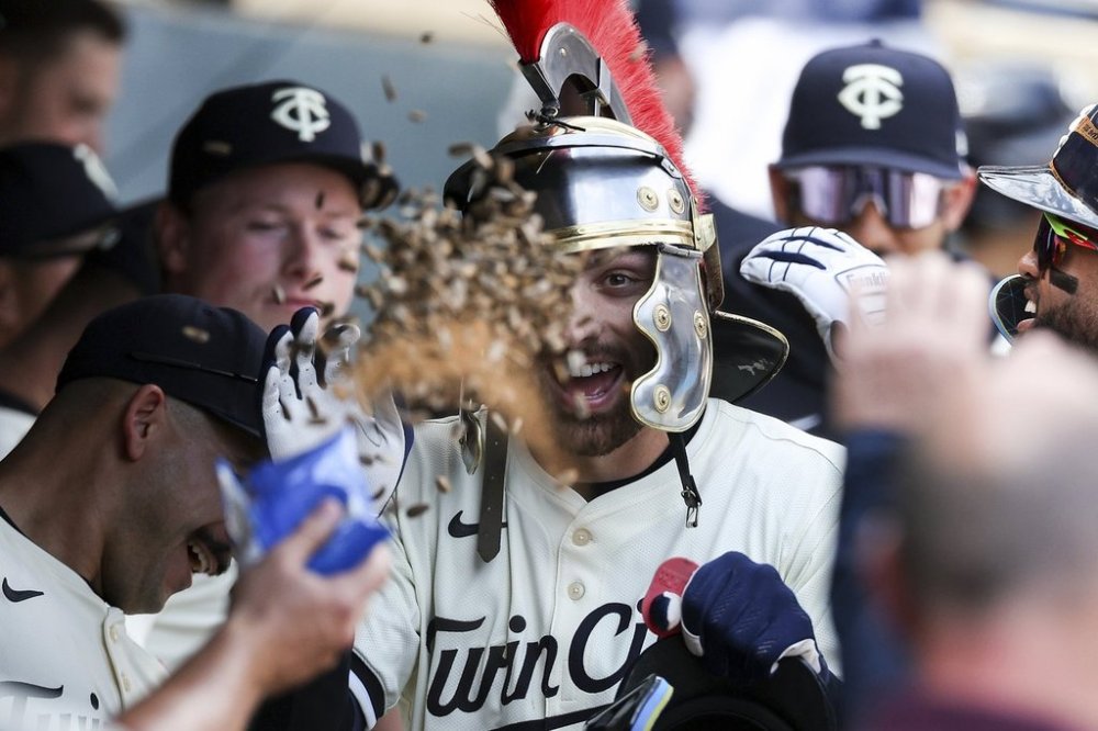Minnesota Twins' Edouard Julien celebrates his solo home run during the sixth inning of a baseball game against the Detroit Tigers Sunday, April 13, 2025, in Minneapolis. (AP Photo/Matt Krohn)
