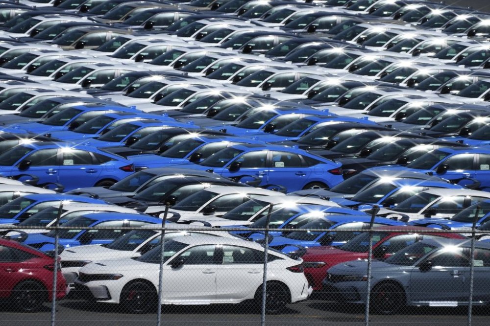 Export vehicles are parked at Daikoku Pier in Yokohama, near Tokyo, Tuesday, April 8, 2025. (AP Photo/Hiro Komae)