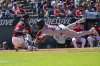 Boston Red Sox's Kristian Campbell, right, scores on a throwing error as Cleveland Guardians' Bo Naylor, left, is late with the tag during the second inning of a baseball game Sunday, April 27, 2025, in Cleveland. (AP Photo/Phil Long)