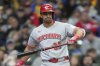 Cincinnati Reds' Christian Encarnacion-Strand reacts after striking out during the fourth inning of a baseball game against the Milwaukee Brewers, Sunday, April 6, 2025, in Milwaukee. (AP Photo/Aaron Gash)